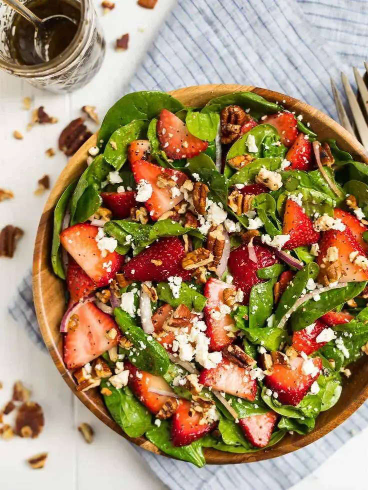 1. Spinach Strawberry Salad Recipe with Balsamic Poppy Seed Dressing by Well Plated
