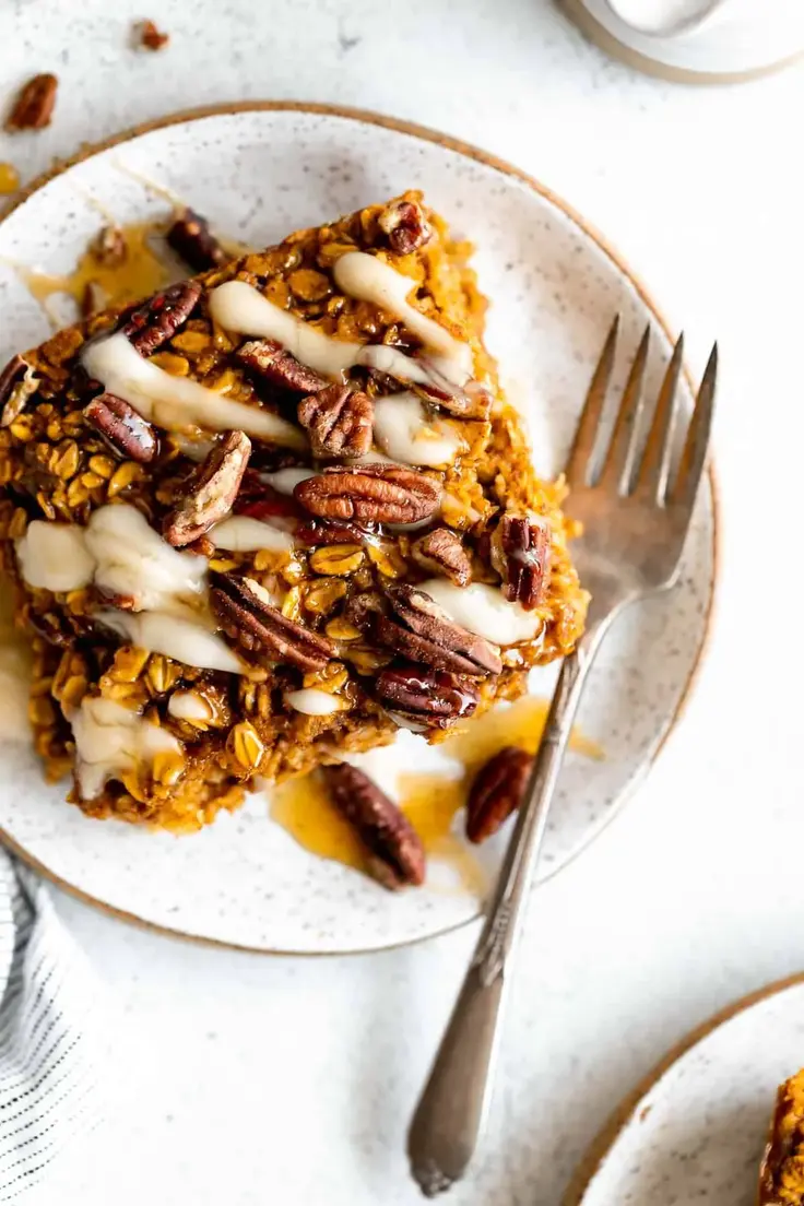 Baked Pumpkin Oatmeal by Eat with Clarity is comes together under 45 minutes and needs only a few simple ingredients!