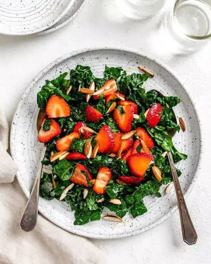 10. Strawberry Kale Salad by Plant Based on a Budget is made with simple fresh ingredients, you can make this salad in under 10 minutes!
