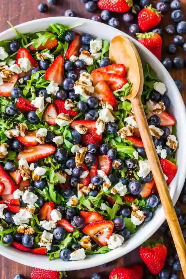 12. Arugula Salad with Berries by Natasha’s Kitchen
