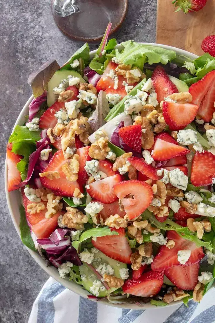 15. Strawberry Walnut Salad with Raspberry Vinaigrette by Craving Some Creativity is Packed with tons of flavor, a crisp, sweet flavor explosion!
