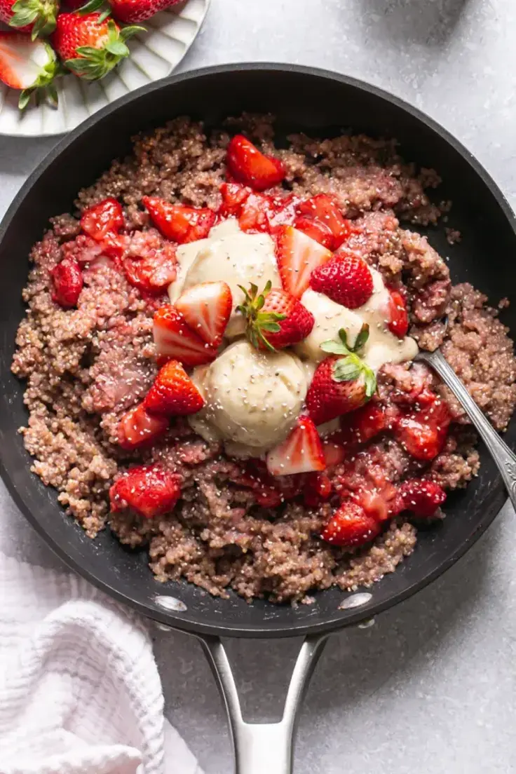 Strawberries and Cream Breakfast Quinoa by Healthy Little Vittles an easy, one-pan, gluten-free, vegan, grain-free breakfast!
