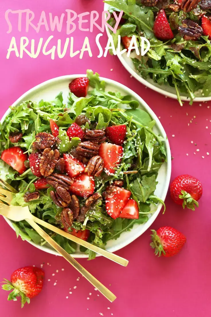 8. Strawberry Arugula Salad by Minimalist Baker made with brown sugar roasted pecans, and a tangy balsamic vinaigrette. Ready in under 30 minutes!
