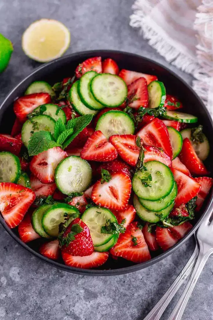9. Cucumber Strawberry Salad Recipes by The Yummy Bowl is vibrant, simple, and refreshing summer salad!
