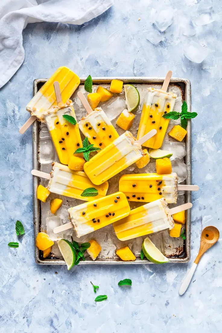 11. Mango Passionfruit Popsicles by The Whimsical Wife (Easy summer popsicle recipes)
