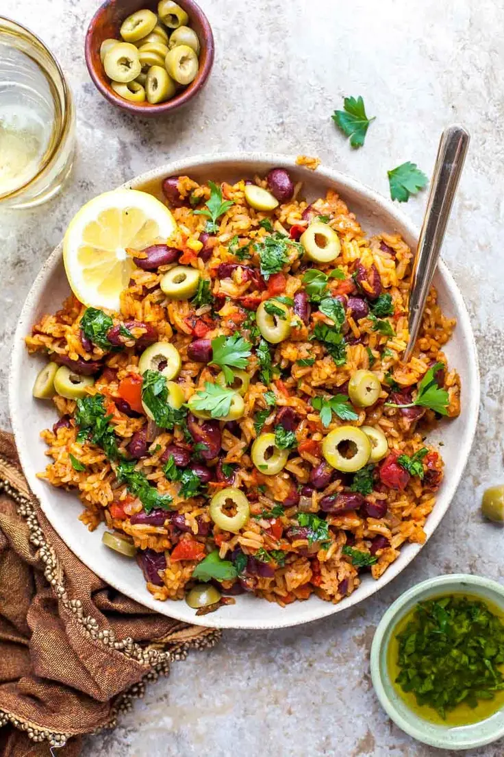 12. Spanish Rice and Beans by Dishing Out Health
