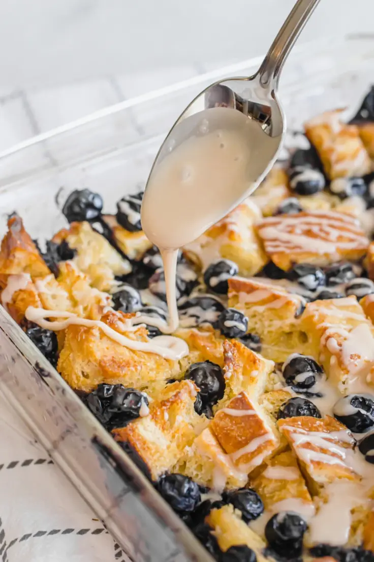 Easy Make Ahead Breakfast Ideas - Blueberry French Toast Casserole with Vanilla Glaze by Thriving Home Blog
