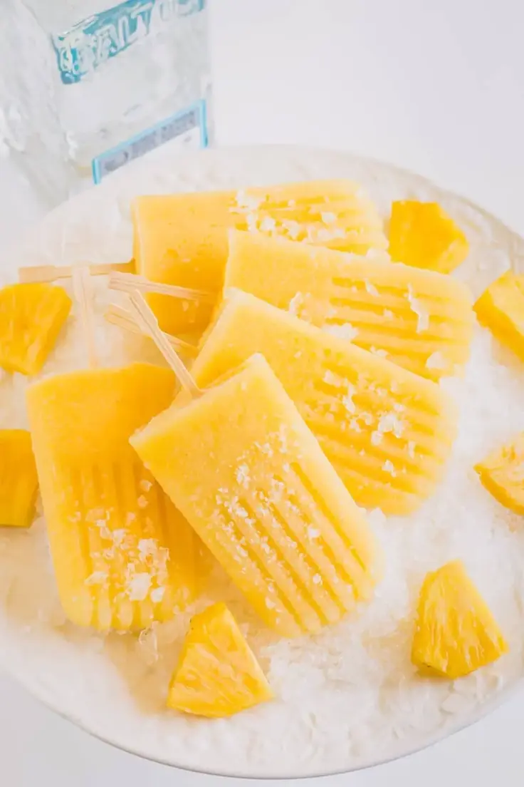 17. Boozy Pineapple Popsicles by Sweet and Savoury by Shinee (Easy summer popsicle recipes)
