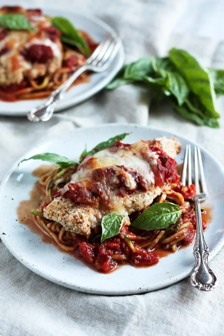 19. Healthy Baked Chicken Parmesan with Zucchini Noodles by Ambitious Kitchen