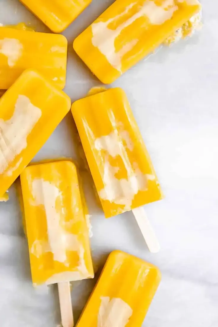 2. Pineapple Mango Popsicle by Eat with Clarity (Easy summer popsicle recipes)
