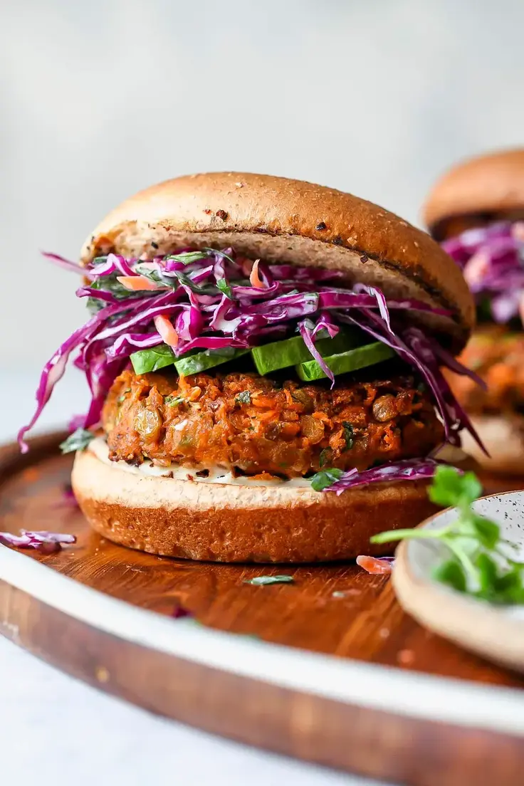 30. Spiced Lentil Burgers with Tahini Slaw by Dishing Out Health
