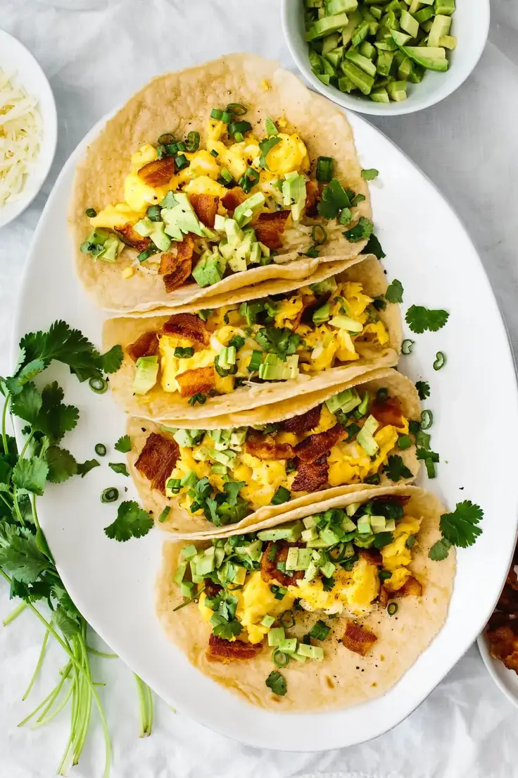 Breakfast Tacos with Eggs & Bacon by Downshiftology
