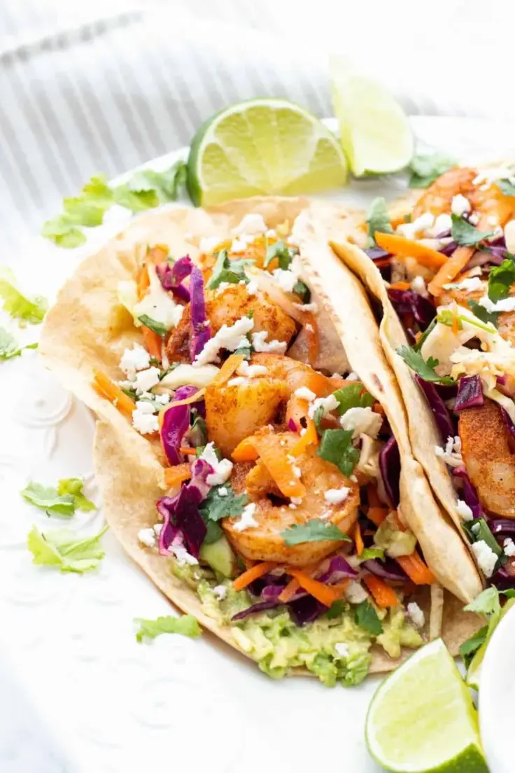 5. Spicy Shrimp Tacos with Cilantro Lime Slaw by Haute and Healthy Living
