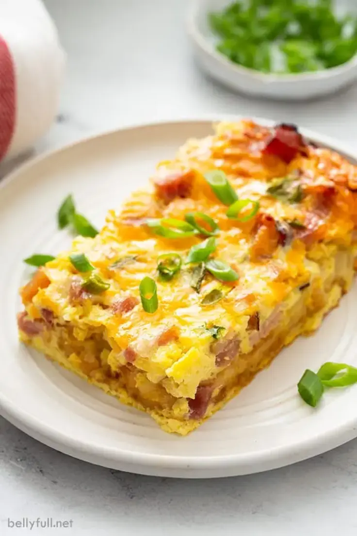 Hash Brown Egg Casserole by Bellyfull is the perfect recipe for leftover holiday ham!
