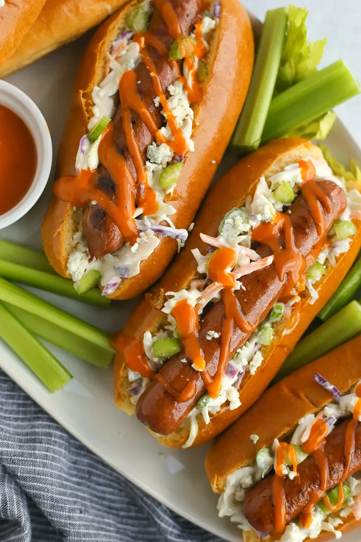 7. Spicy Buffalo Hot Dogs with Blue Cheese Slaw by Streets Smart Nutrition
