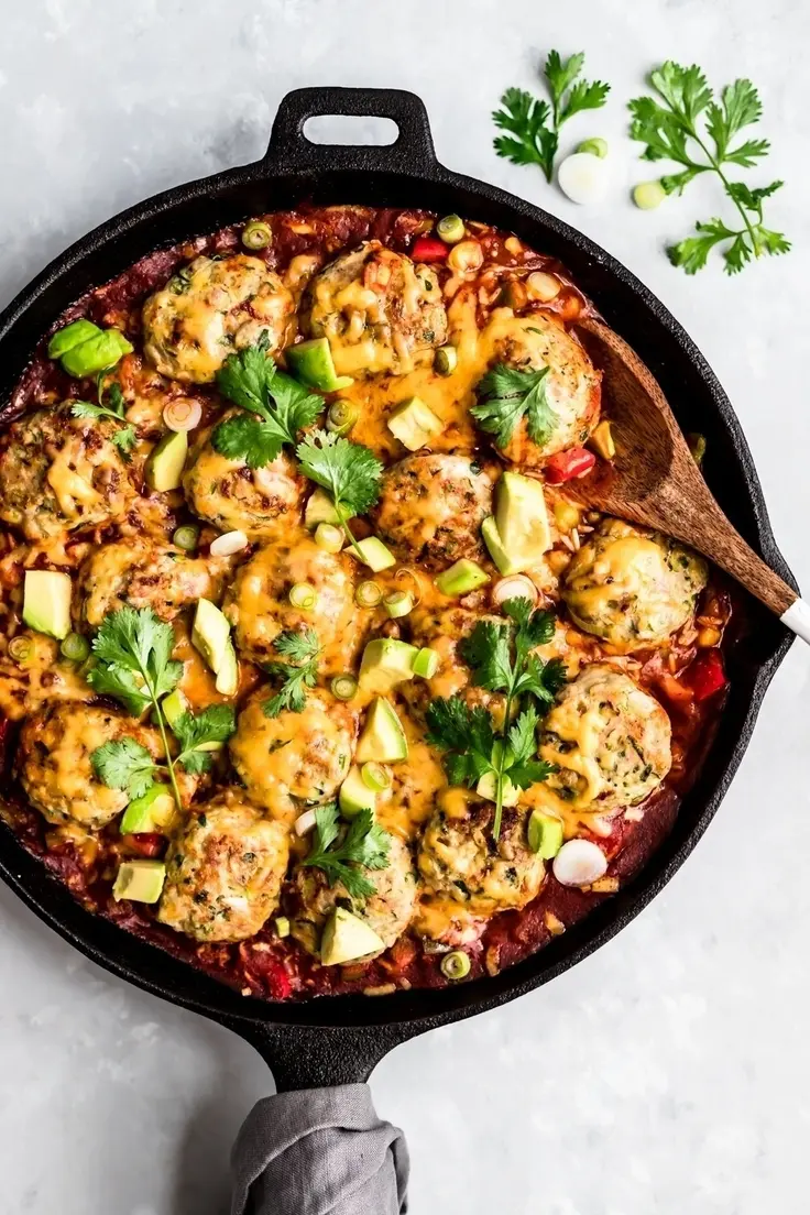 8. One Pan Enchilada Zucchini Turkey Meatballs and Rice by Ambitious Kitchen
