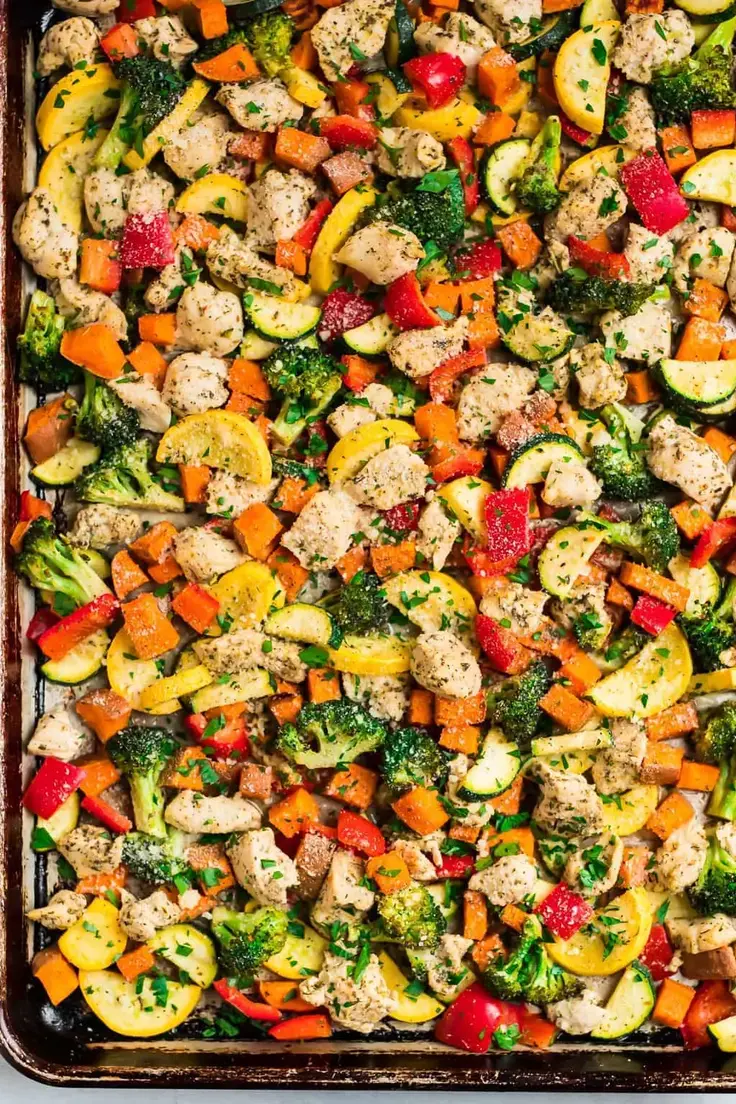 4. Sheet Pan Chicken with Rainbow Vegetables by Well Plated