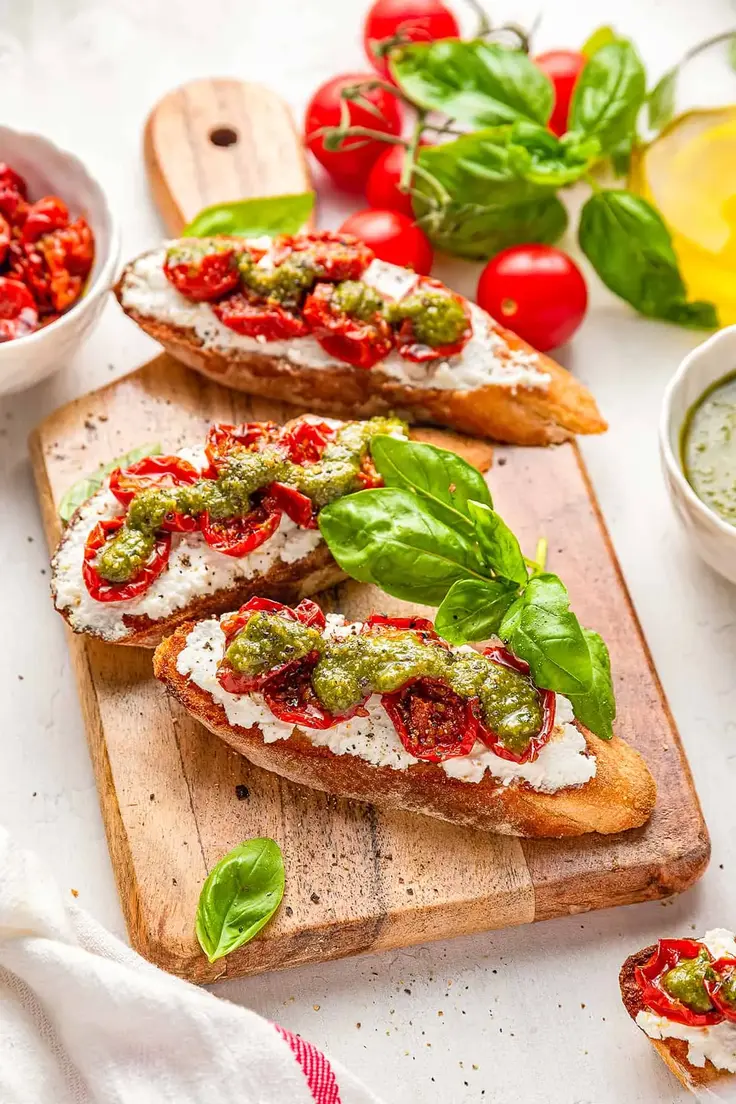 1. Pesto Ricotta Crostini Recipe by The Savory Cipolla