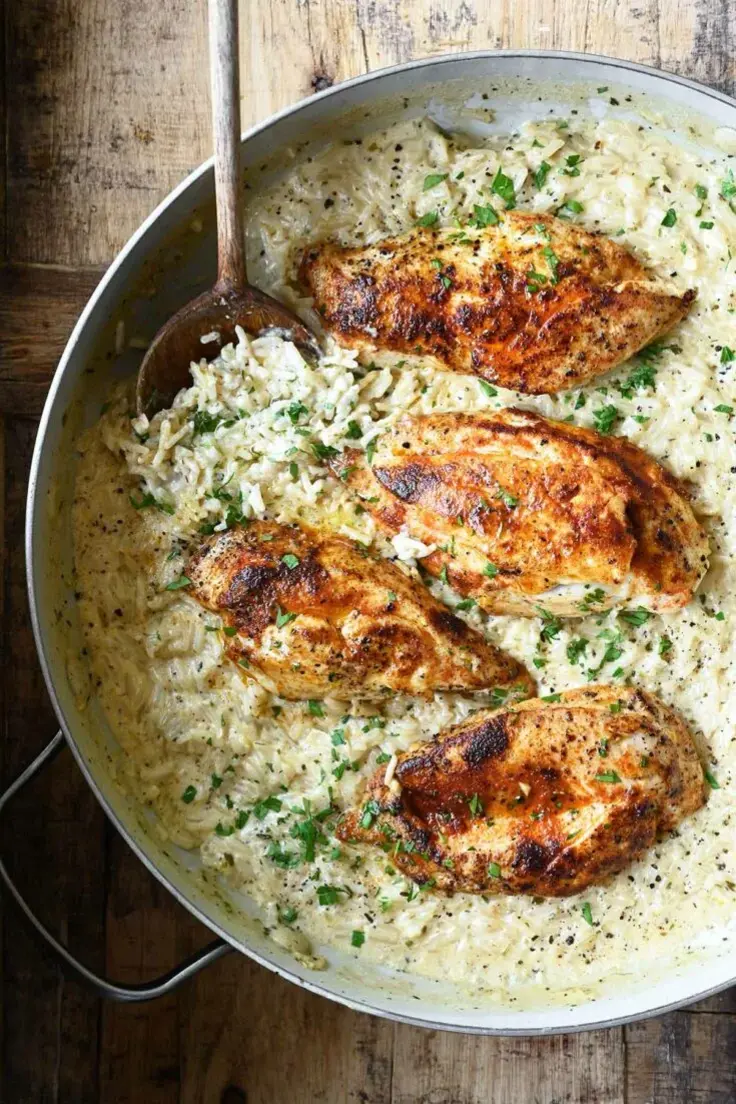 One Pot Creamy Chicken and Rice Recipe by Serving Dumplings