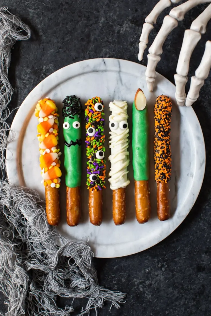 Easy Halloween Party Food Ideas Halloween Pretzel Rods Recipe by A Pumpkin & A Princess
