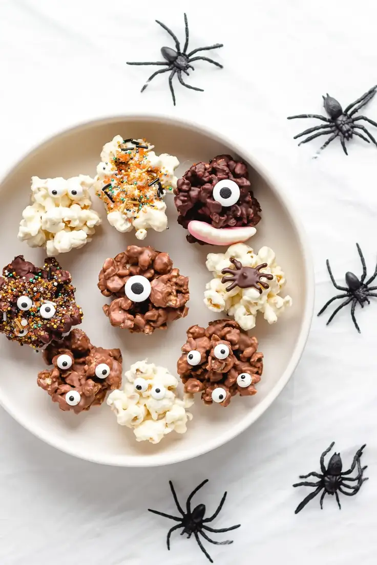 Chocolate Halloween Popcorn Balls Recipe by Maple and Mango
