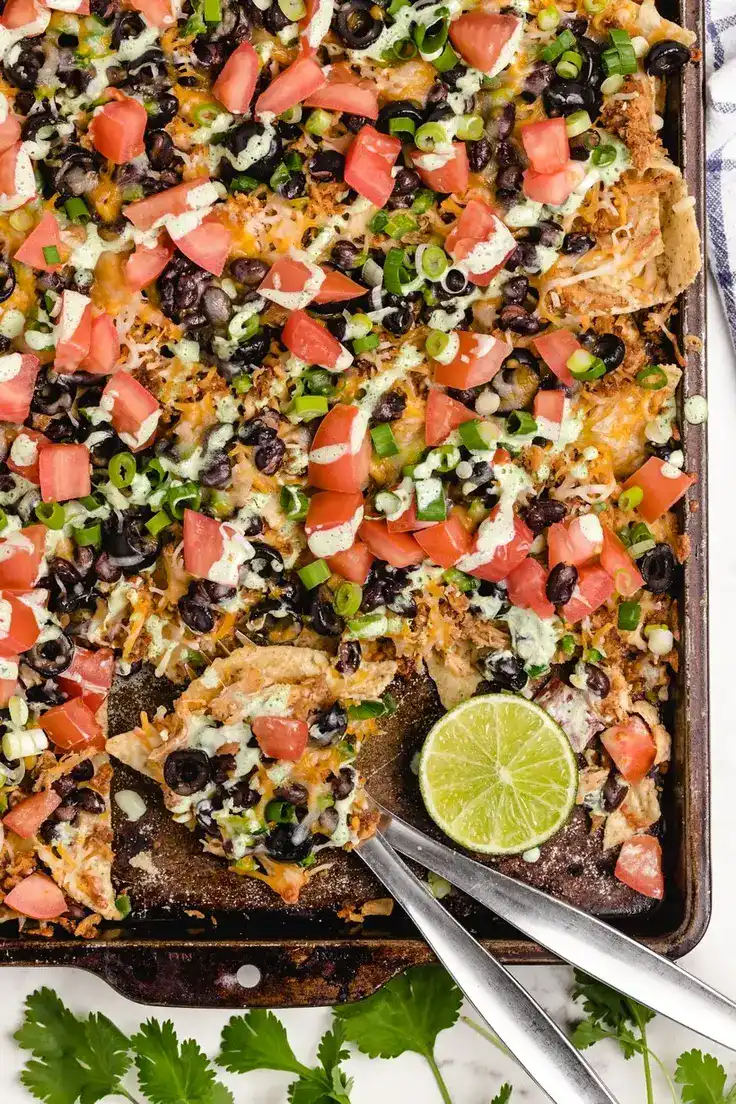 Sheet Pan Chicken Nachos Recipe by Noble Pig
