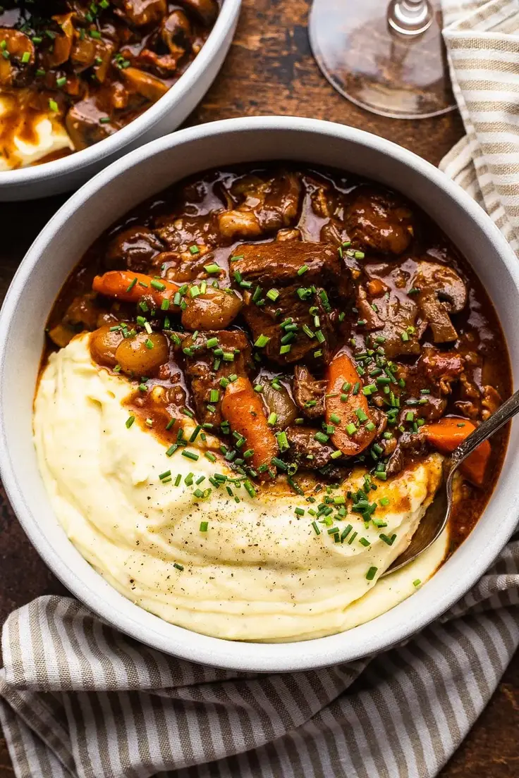 Best Fall Dinner Recipes - Classic Beef Bourguignon Recipe by So Much Food Blog
