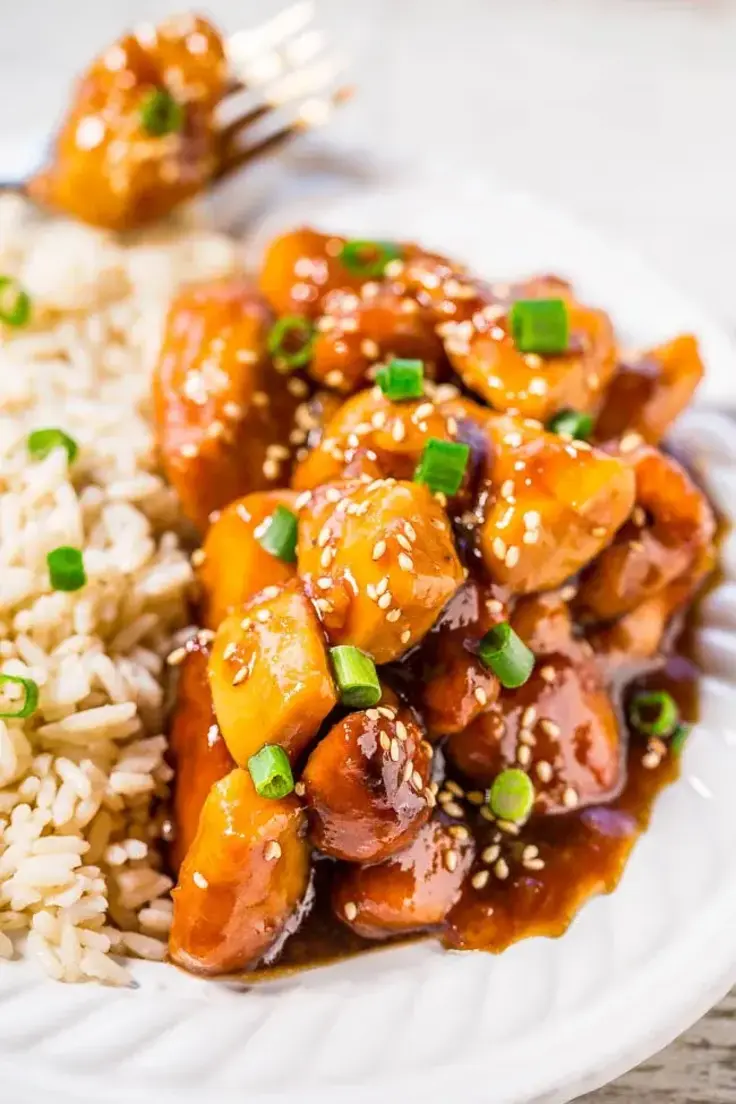 Slow Cooker Orange Chicken Recipe by Averie Cooks
