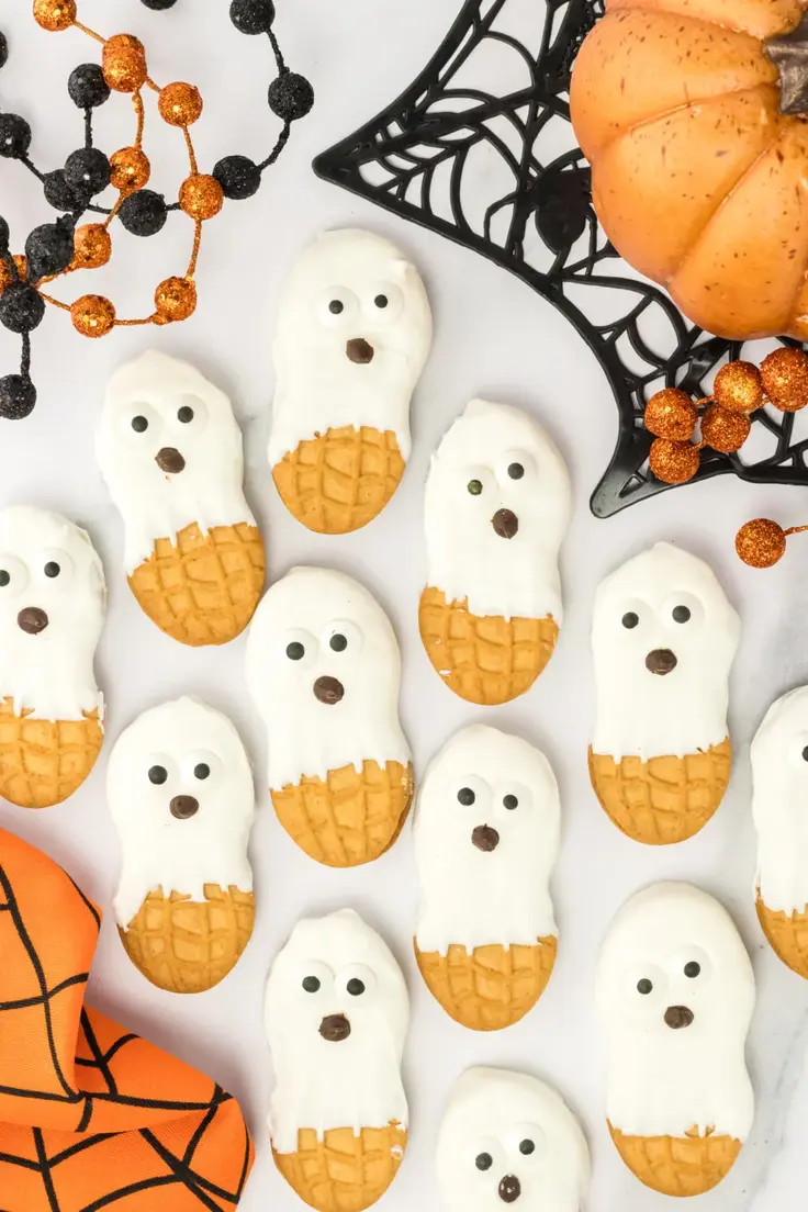 Halloween Cookie Ideas - Nutter Butter Ghost Cookies Recipe by Simplistically Living
