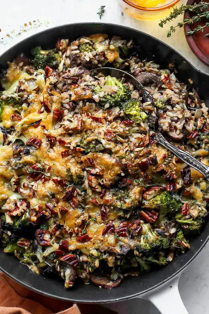 One Pan Wild Rice and Cheesy Broccoli Casserole Recipe by Dishing Out Health
