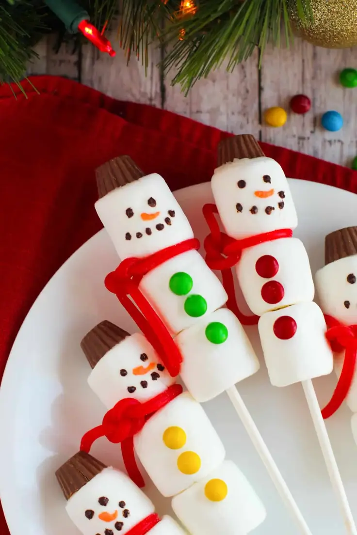 Marshmallow Snowman Pops Recipe by Crayons and Cravings
