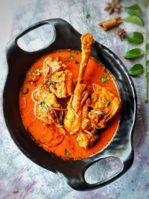 Discover the magic of Mangalorean Kori Rotti — a traditional Mangalorean chicken curry recipe served with crispy rice wafers. Learn about this Tulunadu Sunday special and how to enjoy this iconic coastal Karnataka dish at home!