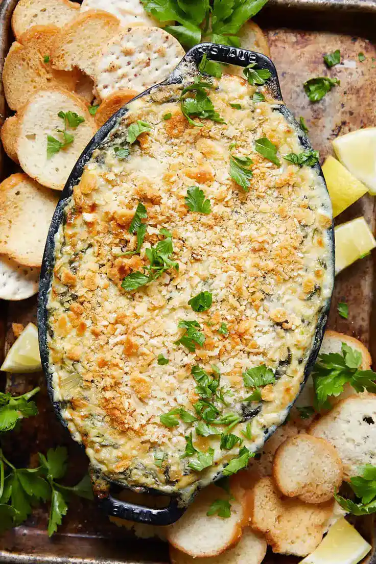Hot Crab Spinach Artichoke Dip Recipe by Bites with Bri