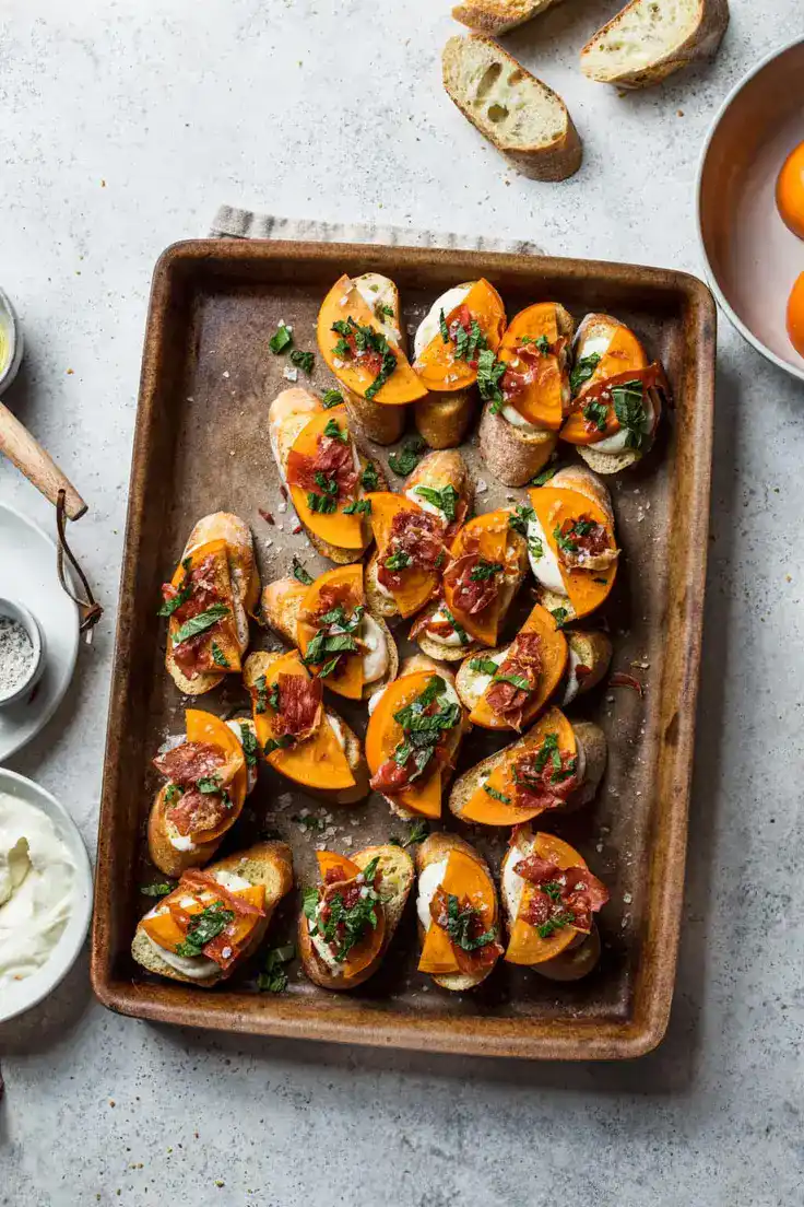 Persimmon Crostini with Crispy Prosciutto and Whipped Ricotta Recipe by Life is But a Dish